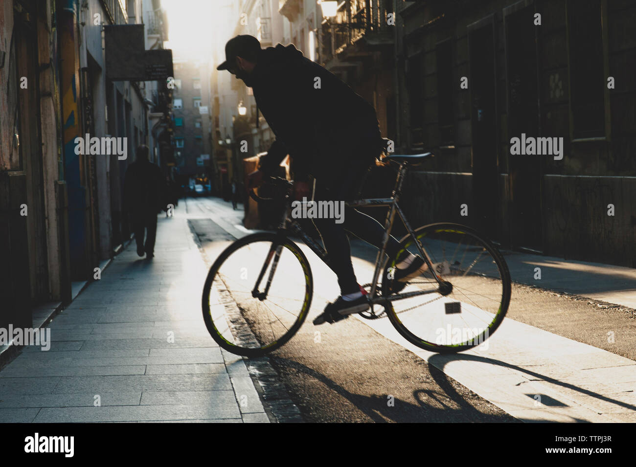 Shadow man riding bicycle on hi-res stock photography and images - Alamy