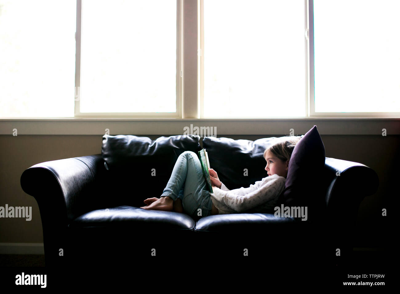 Girl lying on back full length hi-res stock photography and images - Alamy