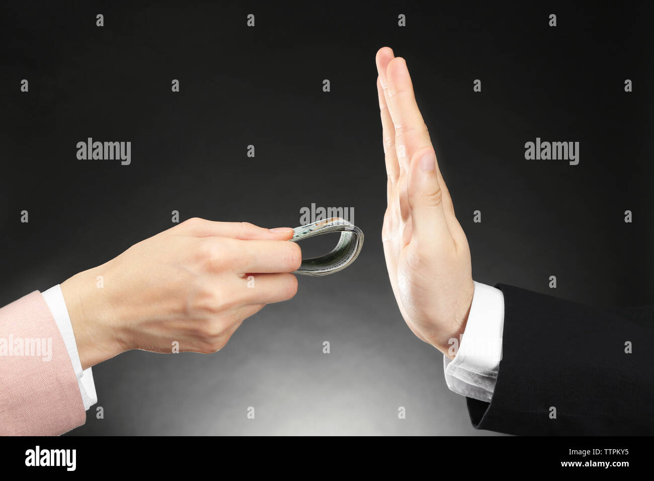 Businessman refusing to take bribe. Corruption concept Stock Photo - Alamy