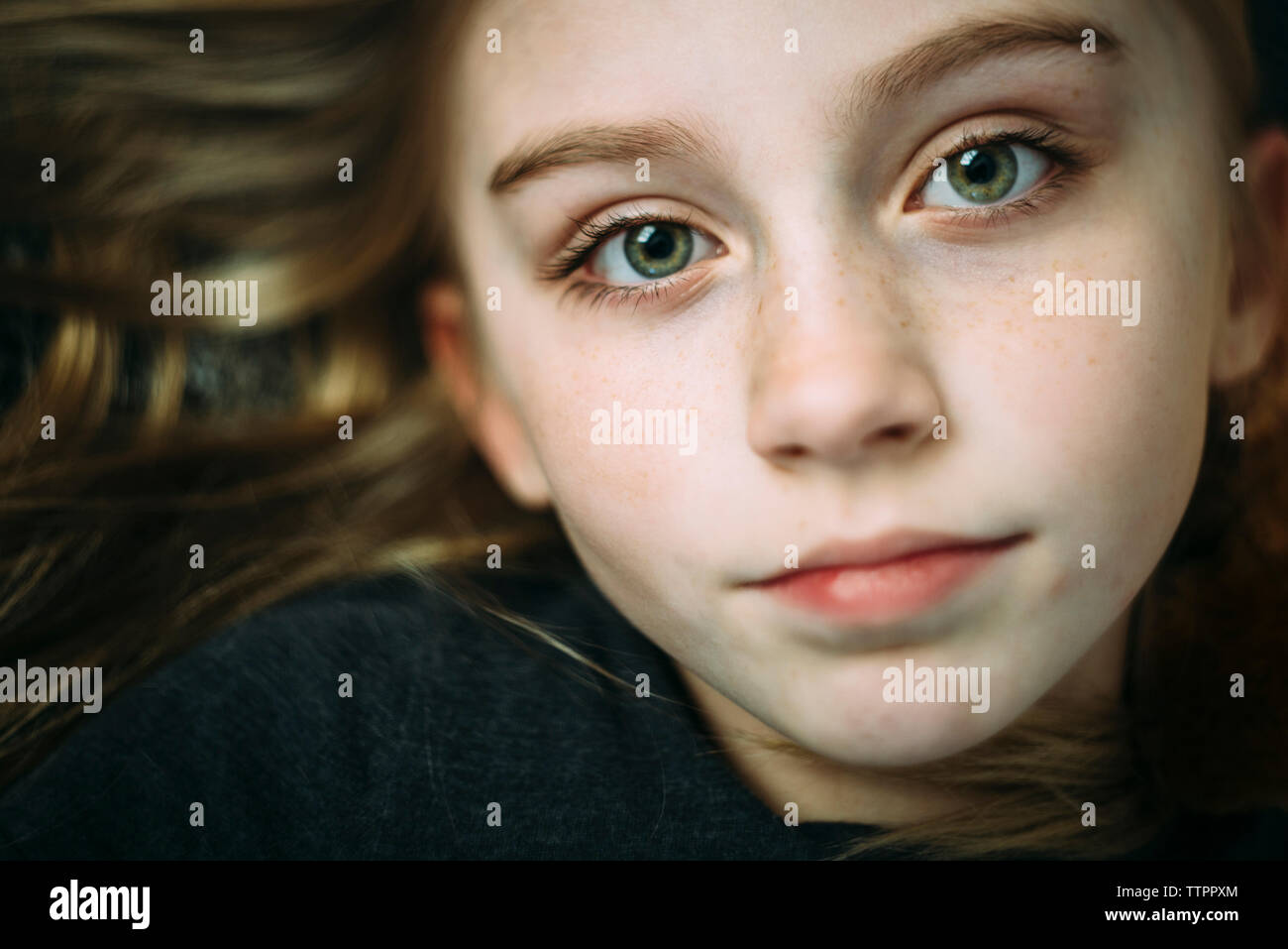 Overhead portrait of girl Stock Photo Alamy