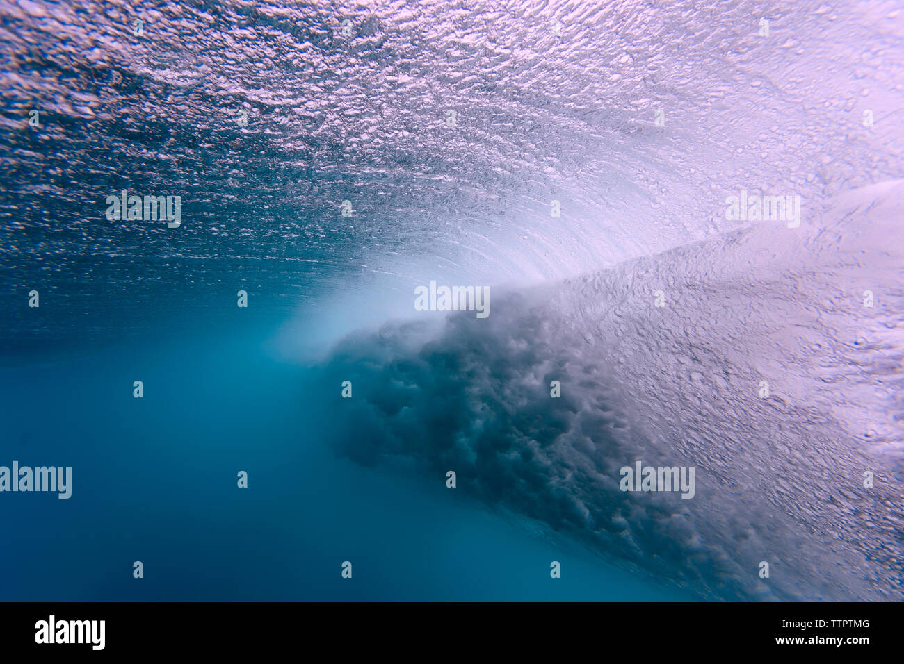 Low angle view of powerful waves breaking undersea at Maldives Stock Photo
