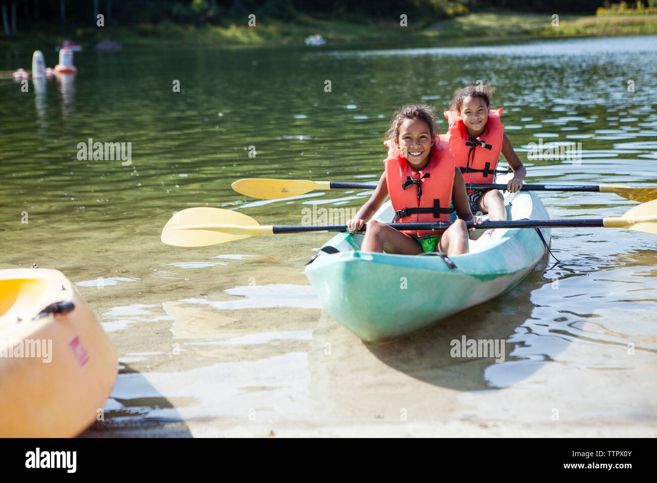 People wearing life jackets hi-res stock photography and images - Alamy
