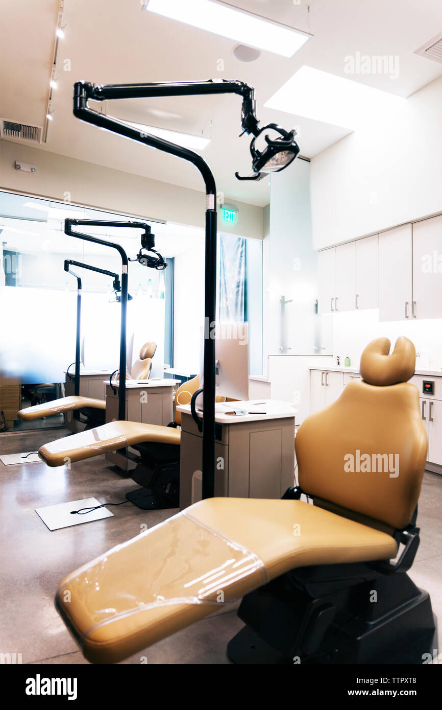 Dentist's chairs in clinic Stock Photo Alamy