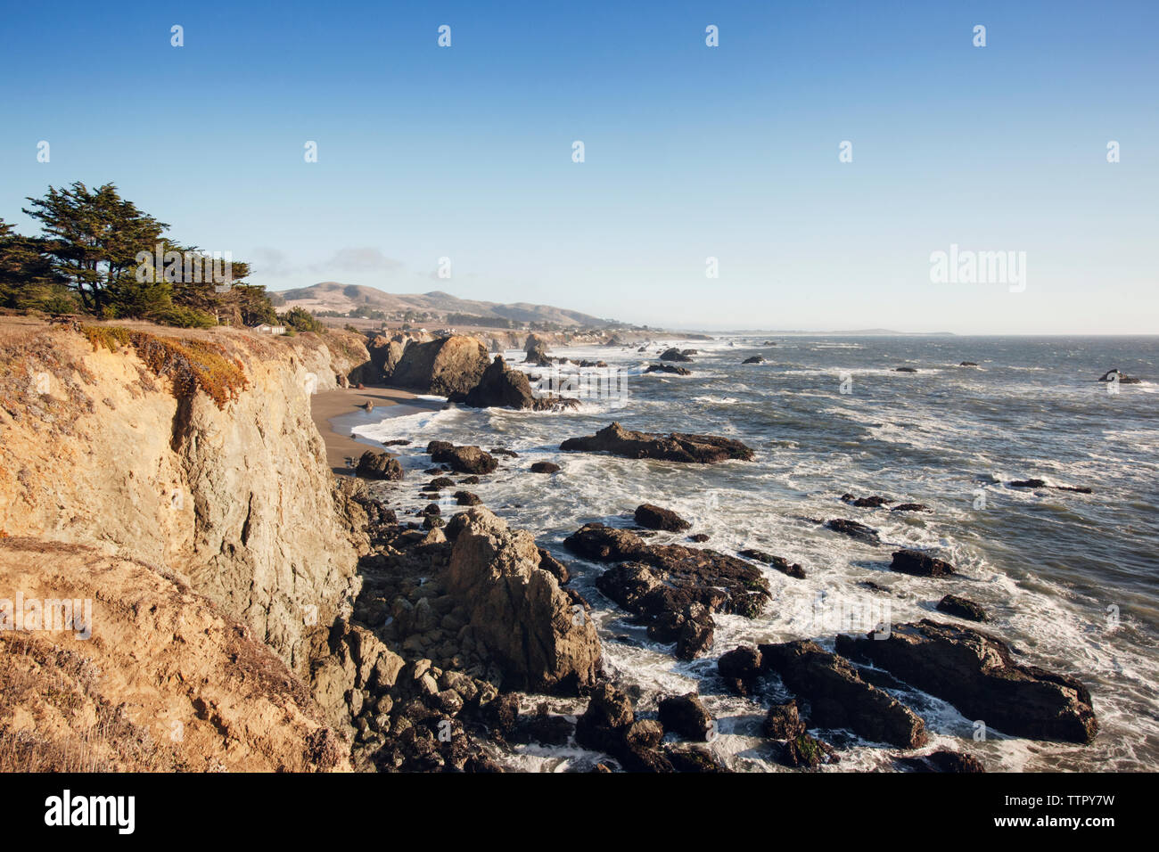 Rugged rocks with blue sky hi-res stock photography and images - Alamy