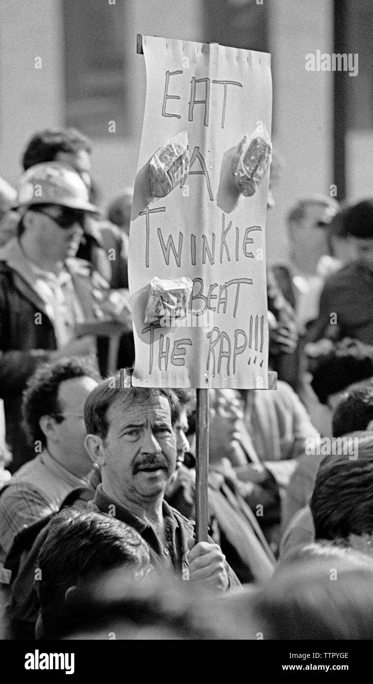 'eat a twinkie beat the rap' sign at a protest of the Dan White sentence for the assassination of gay Supervisor Harvey Milk and Mayor George Moscone in San Francisco, California, 1970s Stock Photo