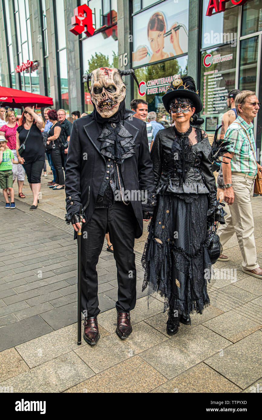 Leipzig, Germany , Juny 9, 2019 . Festive people in black and red gothic  and steampunk costumes at the street Stock Photo - Alamy