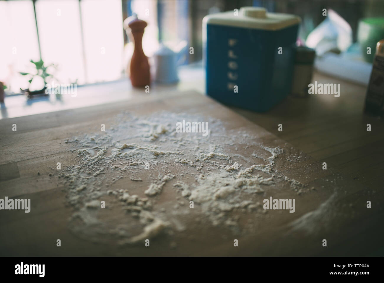 High angle view of flour spilled on table Stock Photo