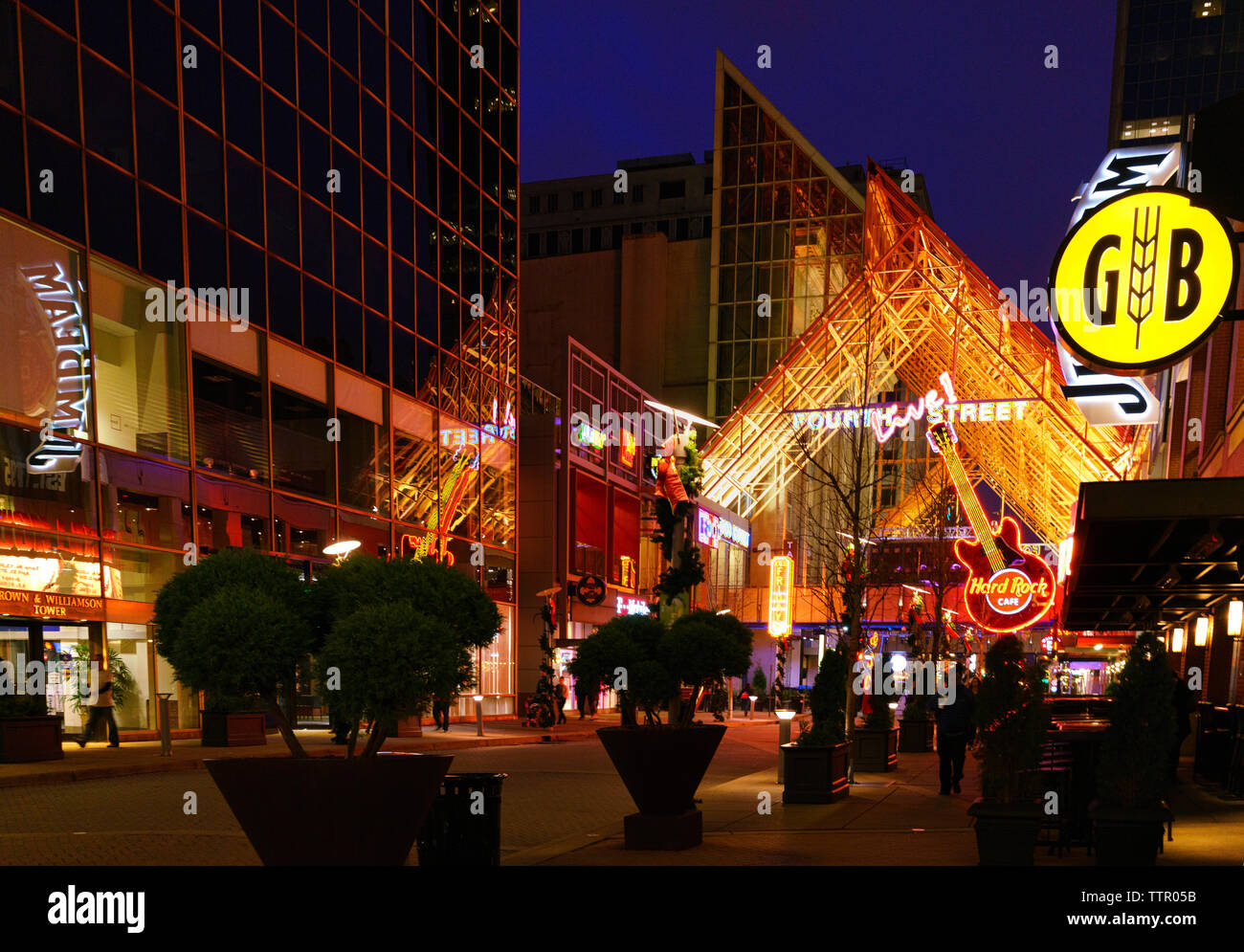 Neon lights Fourth Street Live! at night, a downtown Louisville, Kentucky complex with restaurants, bars, nightlife, sports and entertainment venues Stock Photo