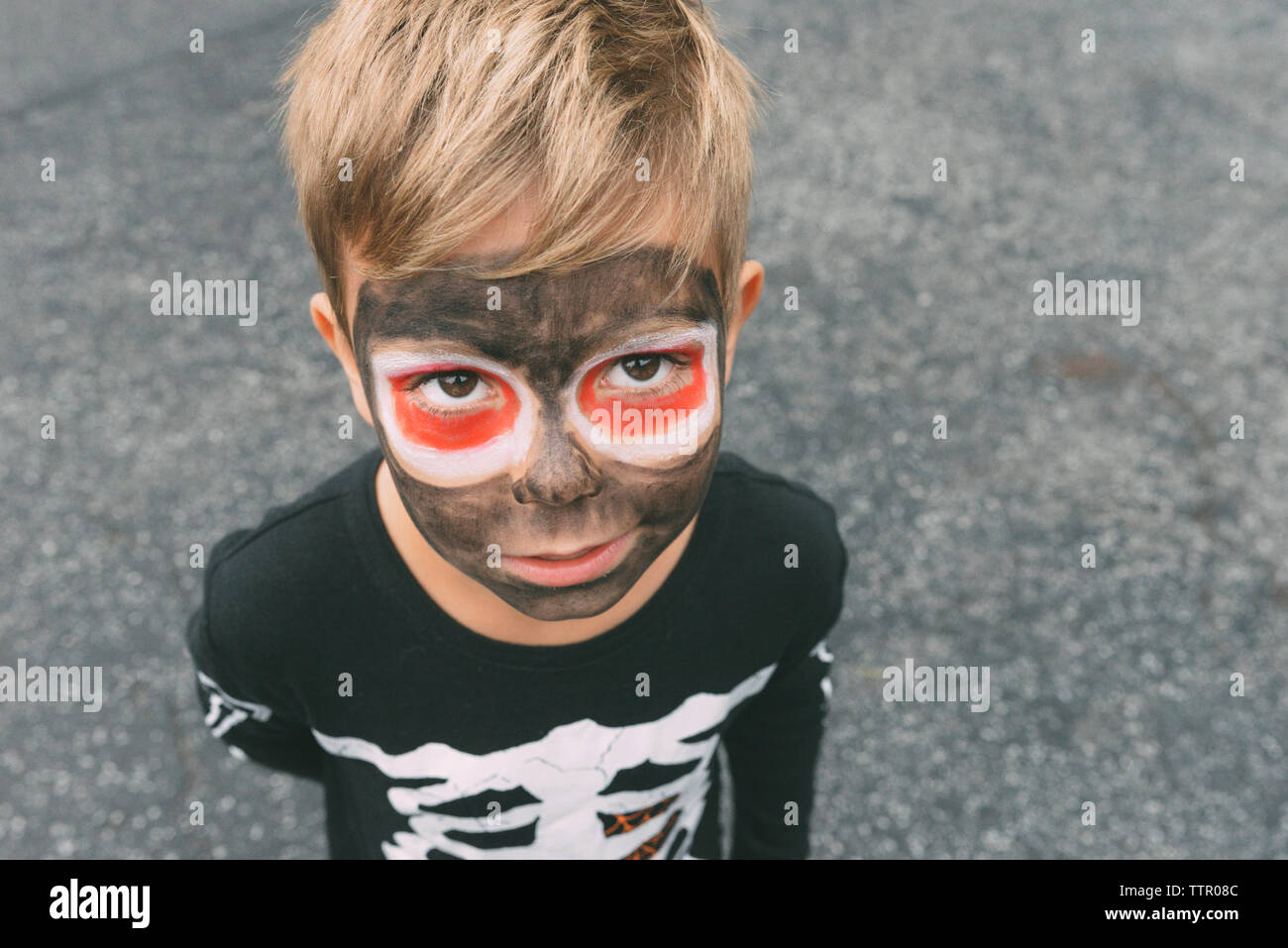 High angle portrait of boy with face paint during Halloween Stock Photo