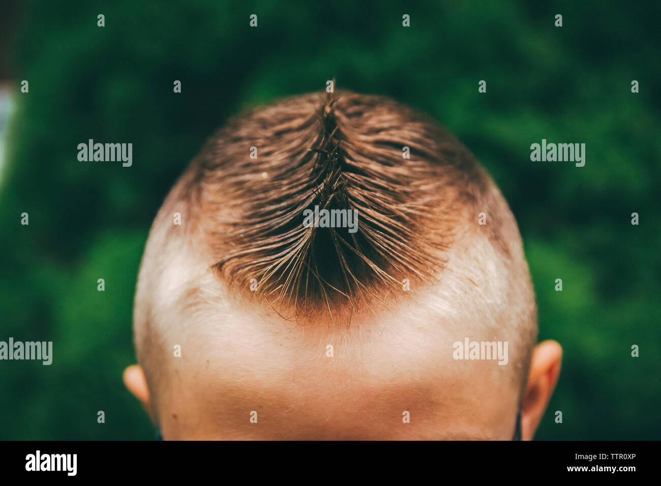 High angle view of boy with spiky hair Stock Photo