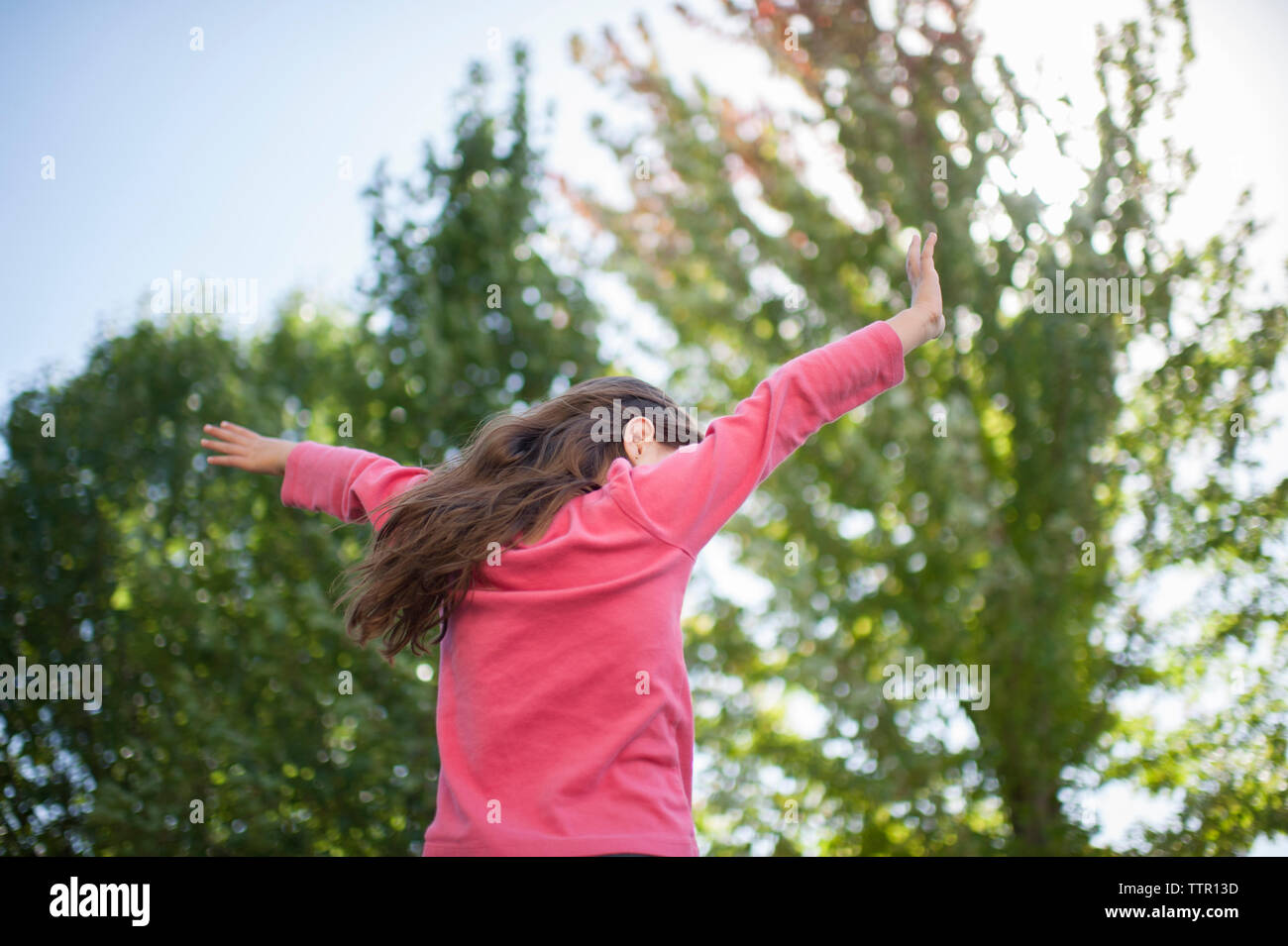 Girl with arms outstretched hi-res stock photography and images - Alamy