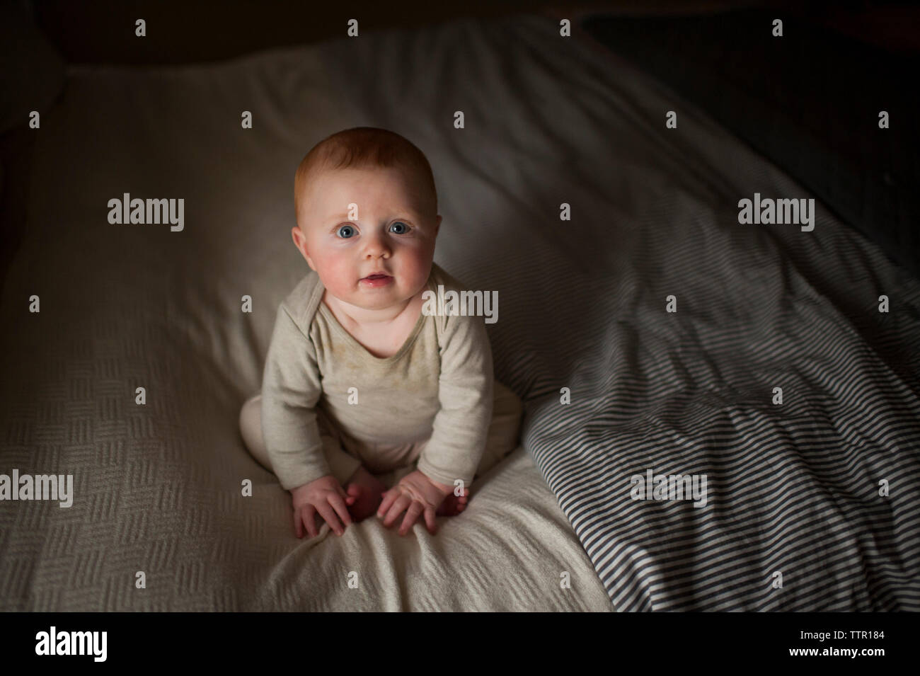 Boy sitting in bed hi-res stock photography and images - Alamy