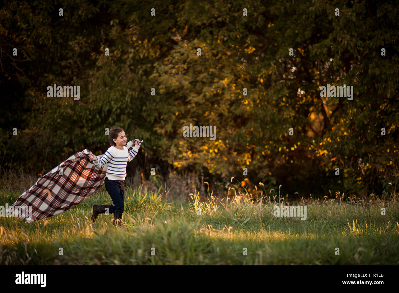 Running with blanket hires stock photography and images Alamy