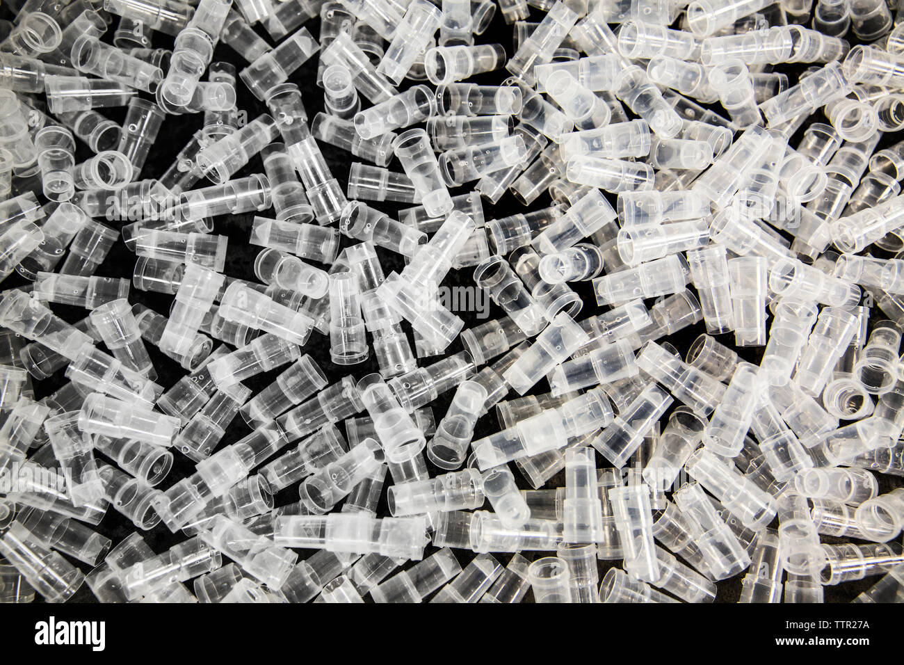 Overhead view of syringe tip caps on table in laboratory Stock Photo Alamy