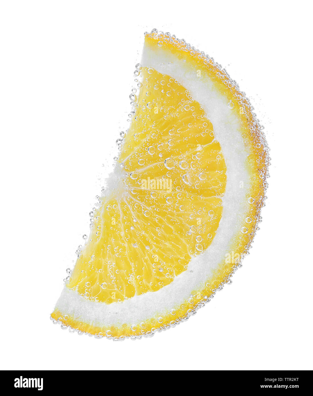 Orange slice in a water on white background Stock Photo - Alamy