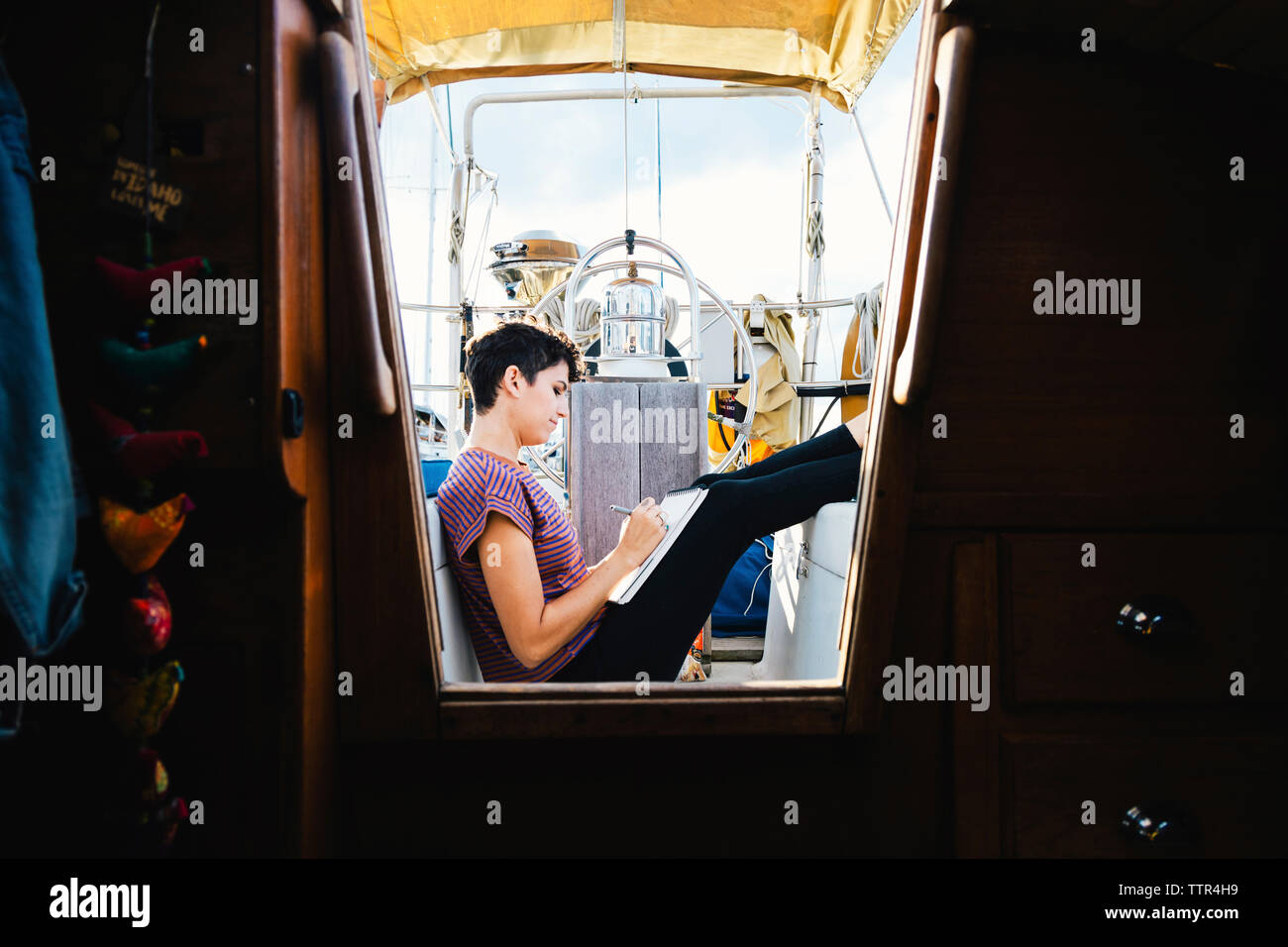 Woman wheel boat hi-res stock photography and images - Alamy