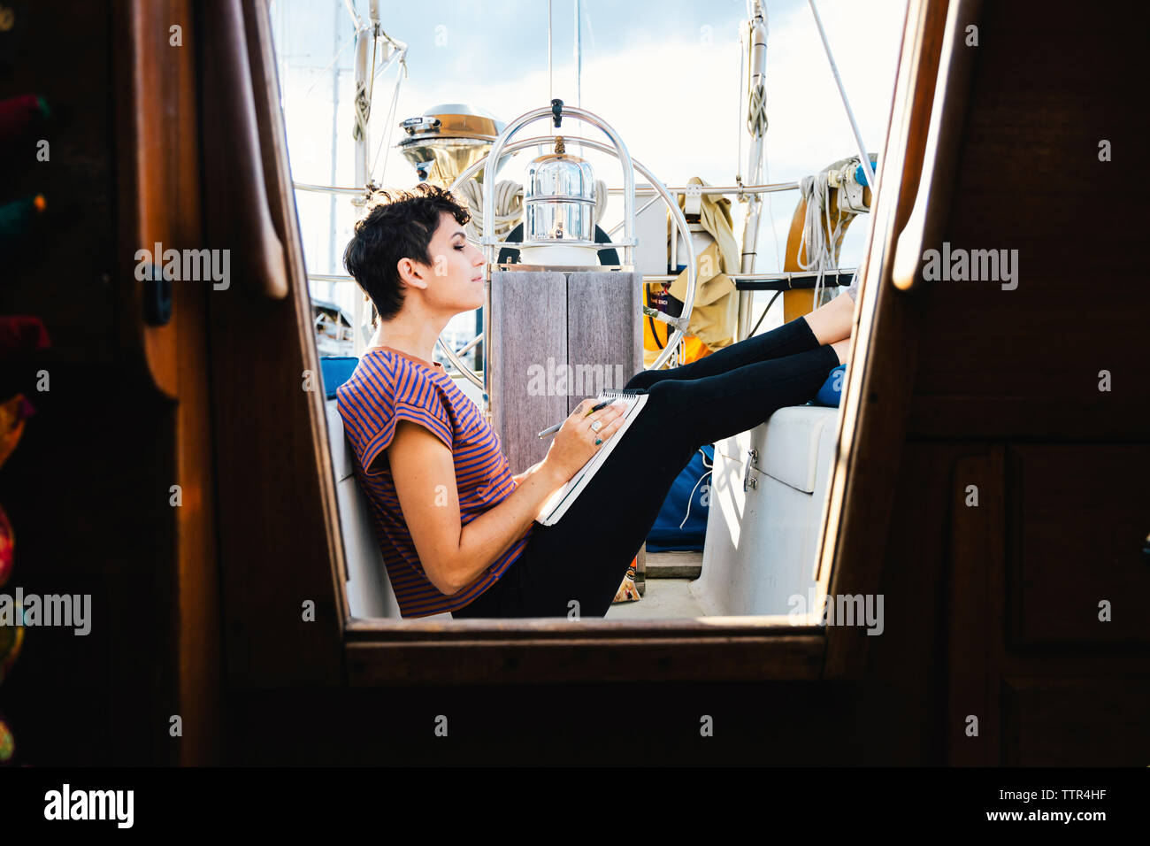Woman wheel boat hi-res stock photography and images - Alamy
