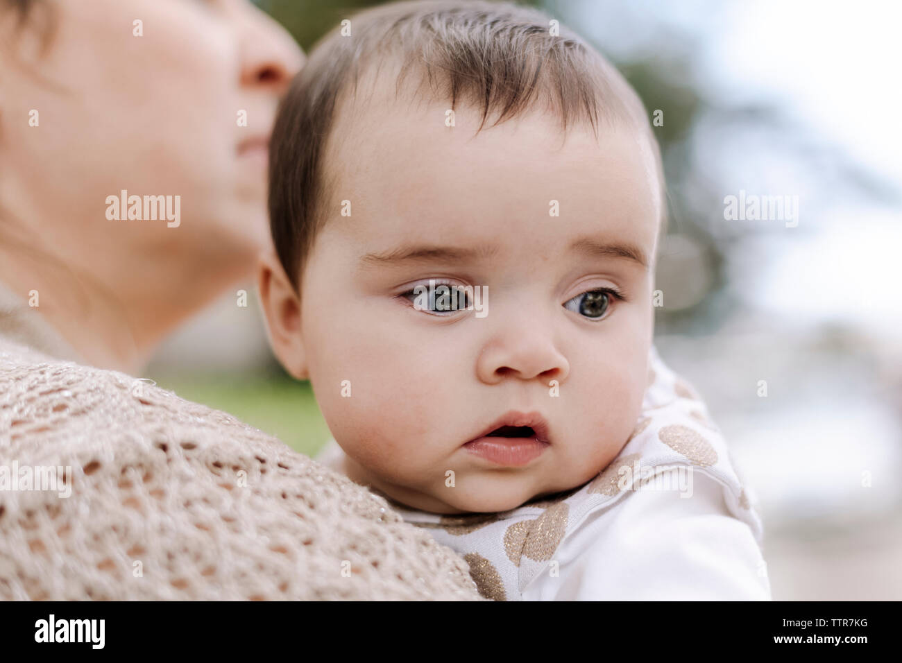 Close up of baby with big eyes outdoor Stock Photo