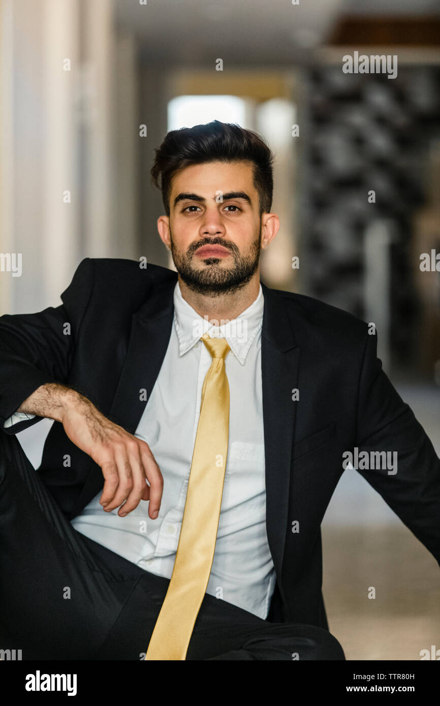 Old man in suit sitting hi-res stock photography and images - Alamy