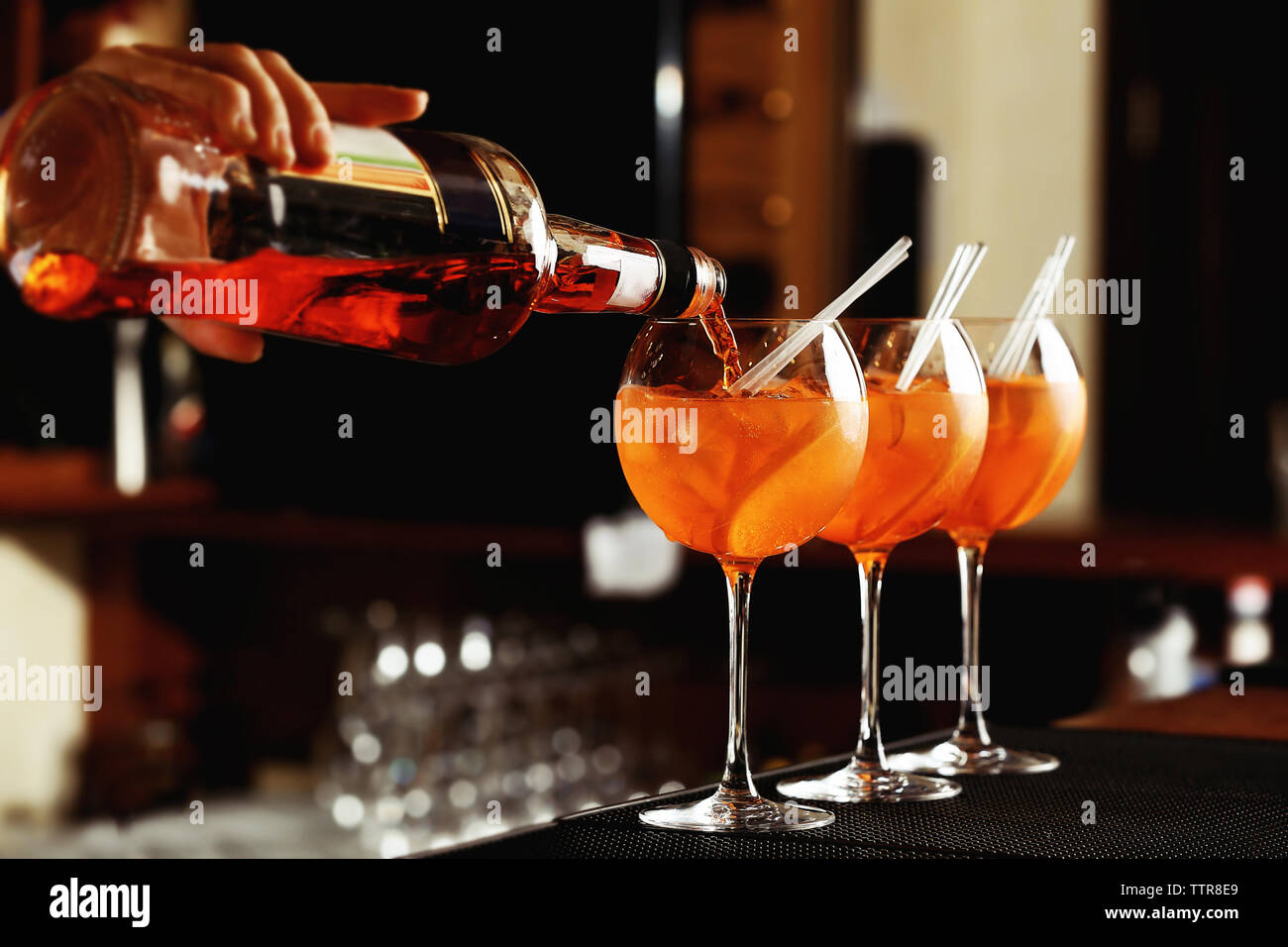 Woman hands making cocktail on bar counter Stock Photo Alamy
