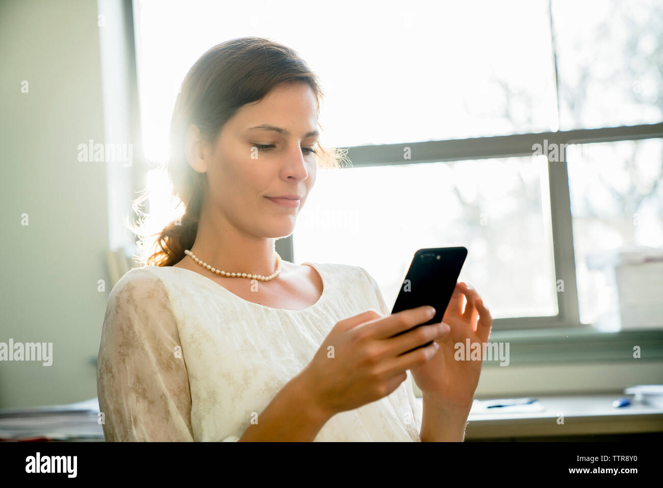 Smart phone while working hi-res stock photography and images - Alamy