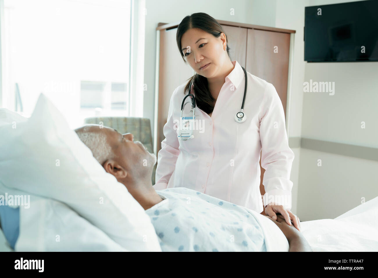 Indian doctor with female patient hi-res stock photography and images ...