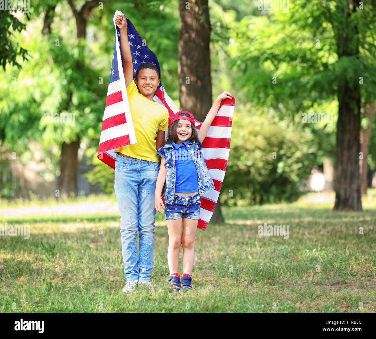 Girl holding american flag hi-res stock photography and images - Alamy