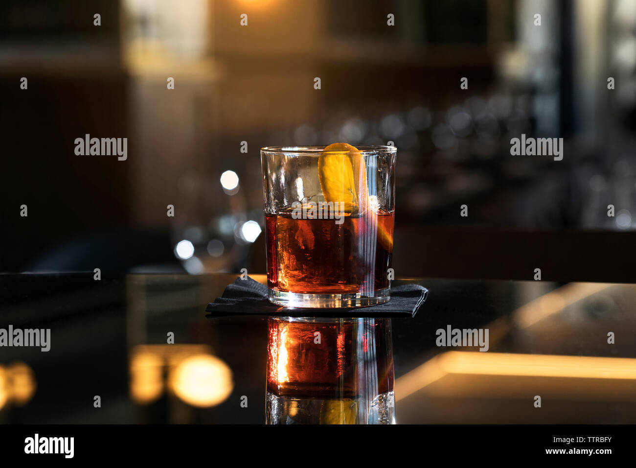 Alcohol in drinking glass at bar Stock Photo