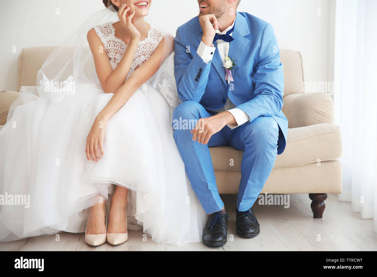 Bride sitting on couch hi-res stock photography and images - Alamy