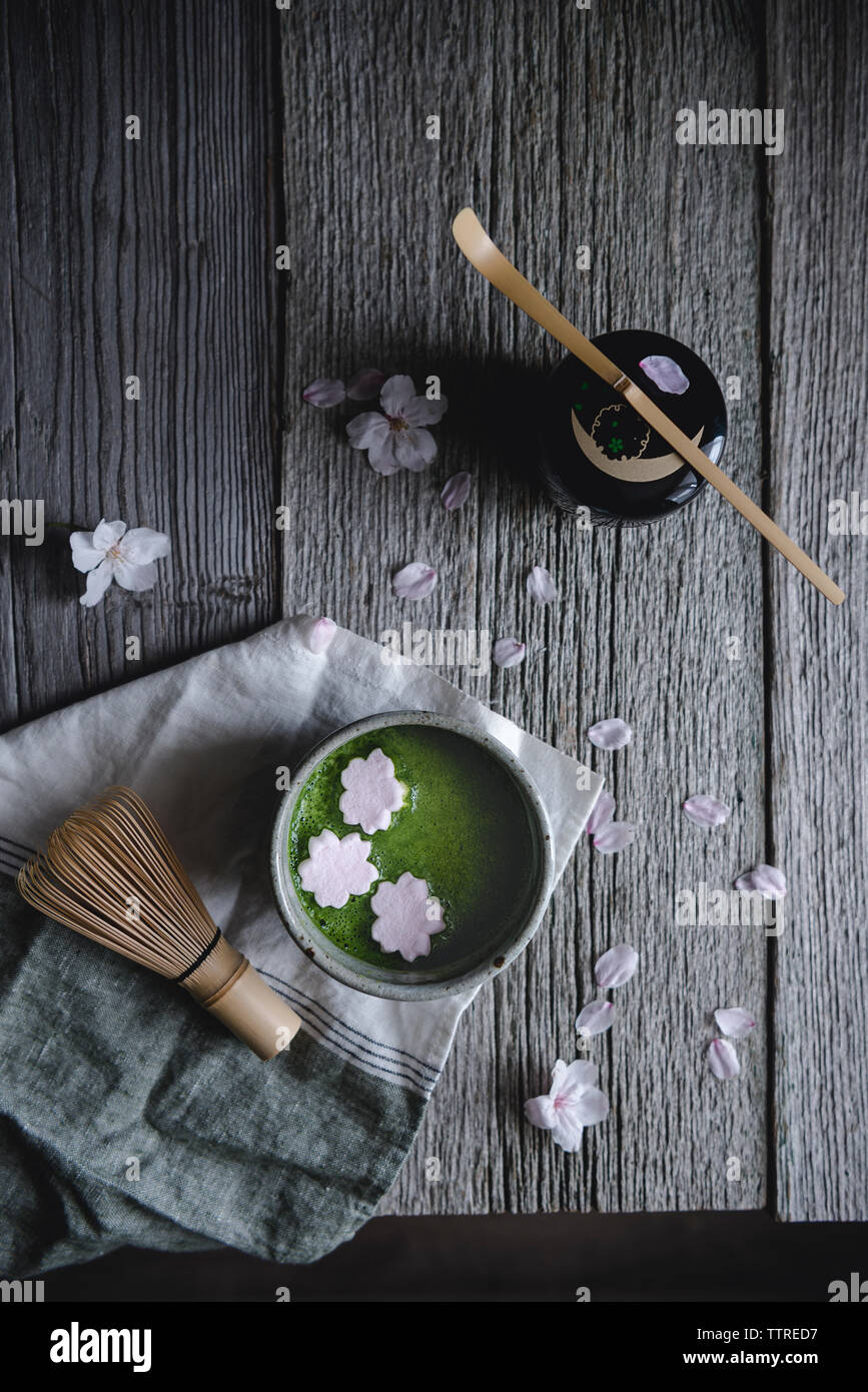Overhead view of Macha tea with marshmallows on wooden table Stock Photo