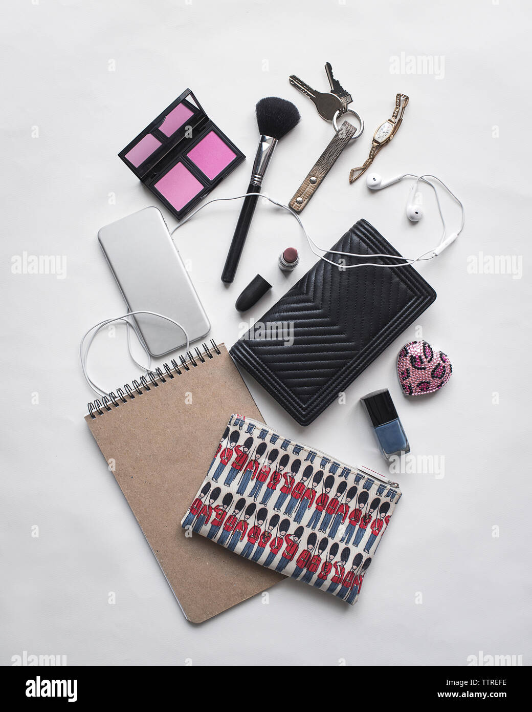 Overhead view of personal accessories on white background Stock Photo