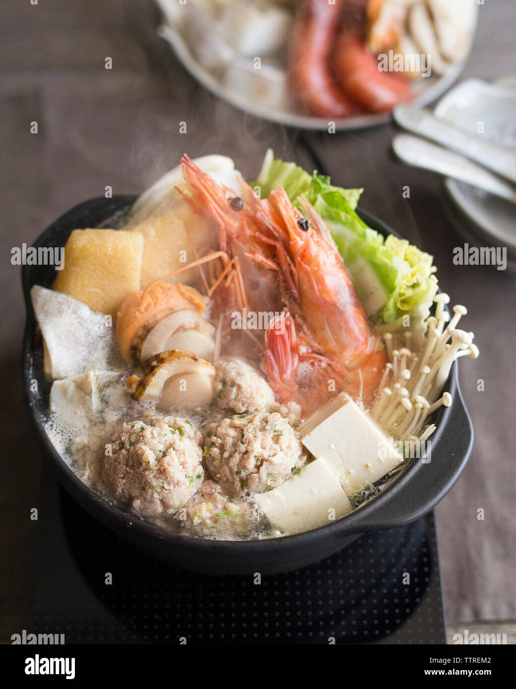 High angle view of Japanese stew in bowl on table Stock Photo