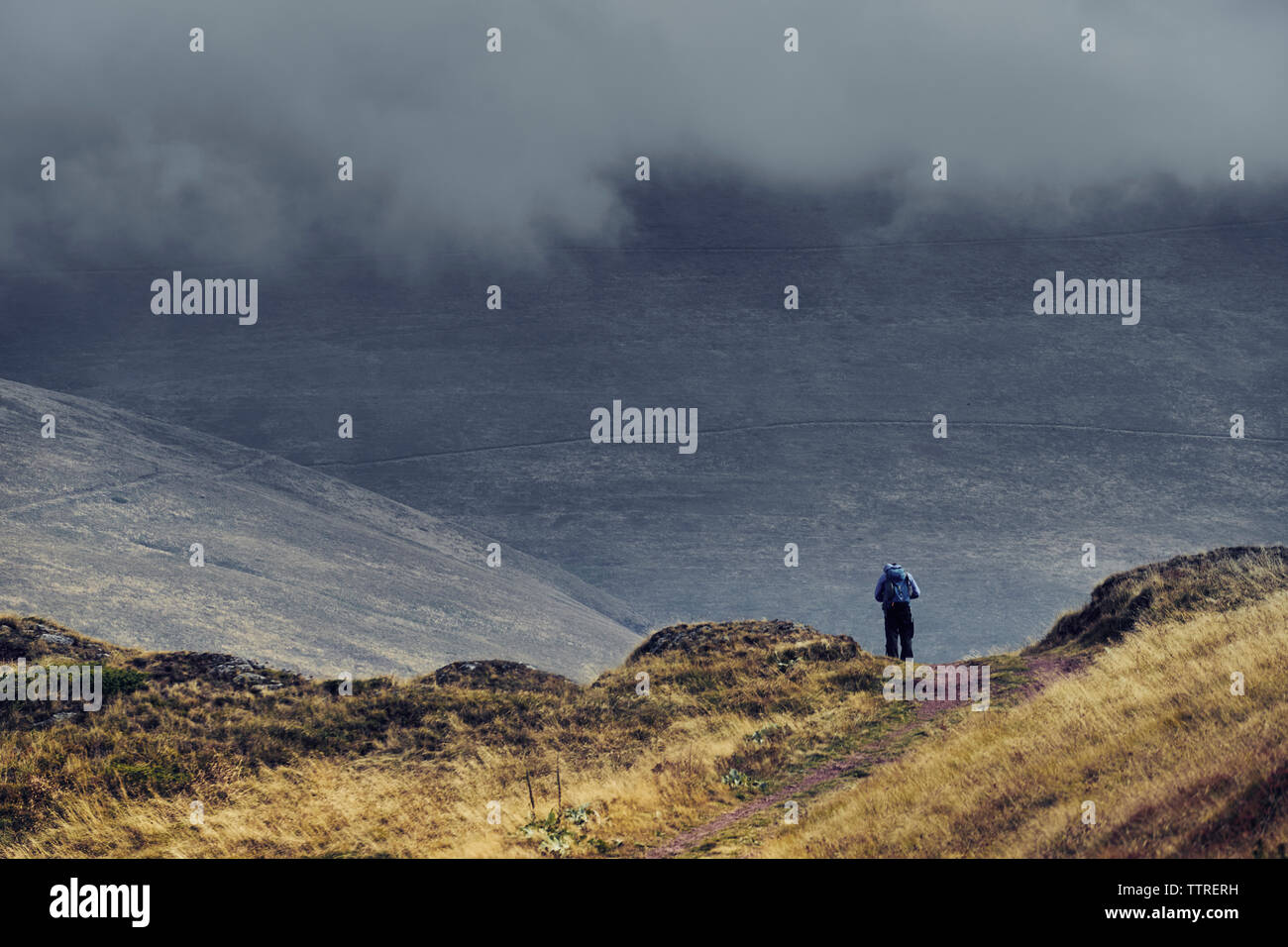 Hiking man standing he mountains hi-res stock photography and images ...