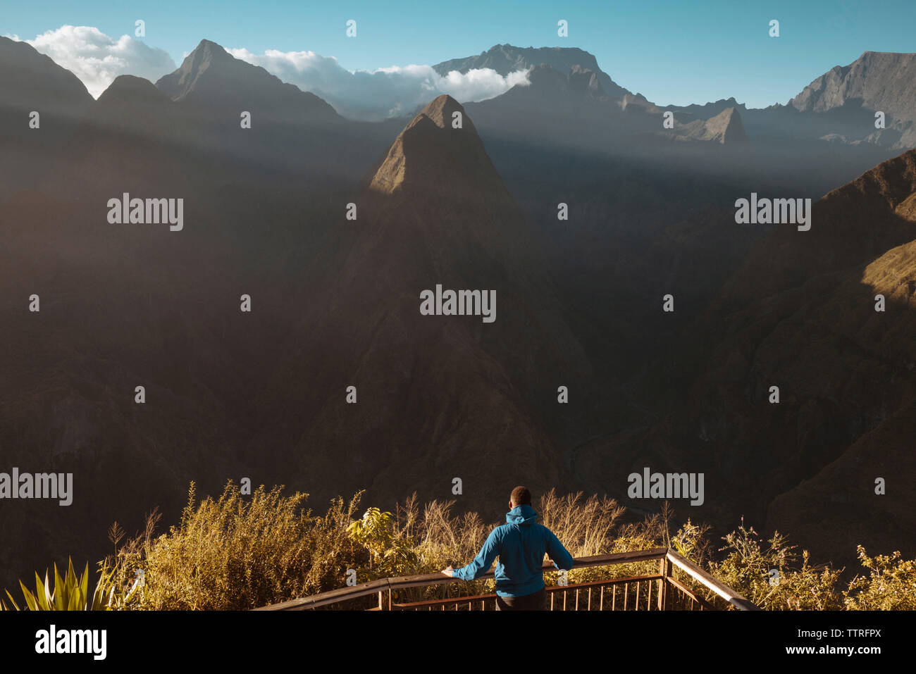 Observing Rear View Young man standing railing observation hi-res stock photography and ...