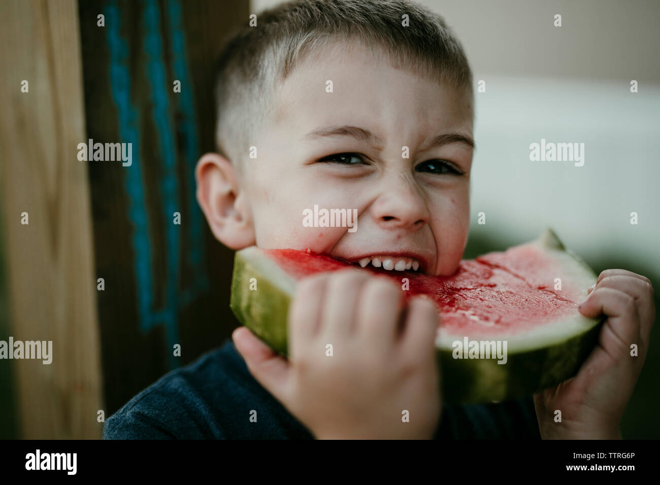 Portrait of boy eating watermelon Stock Photo