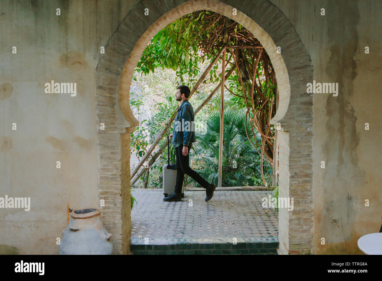Man walking side view jacket hi-res stock photography and images - Alamy