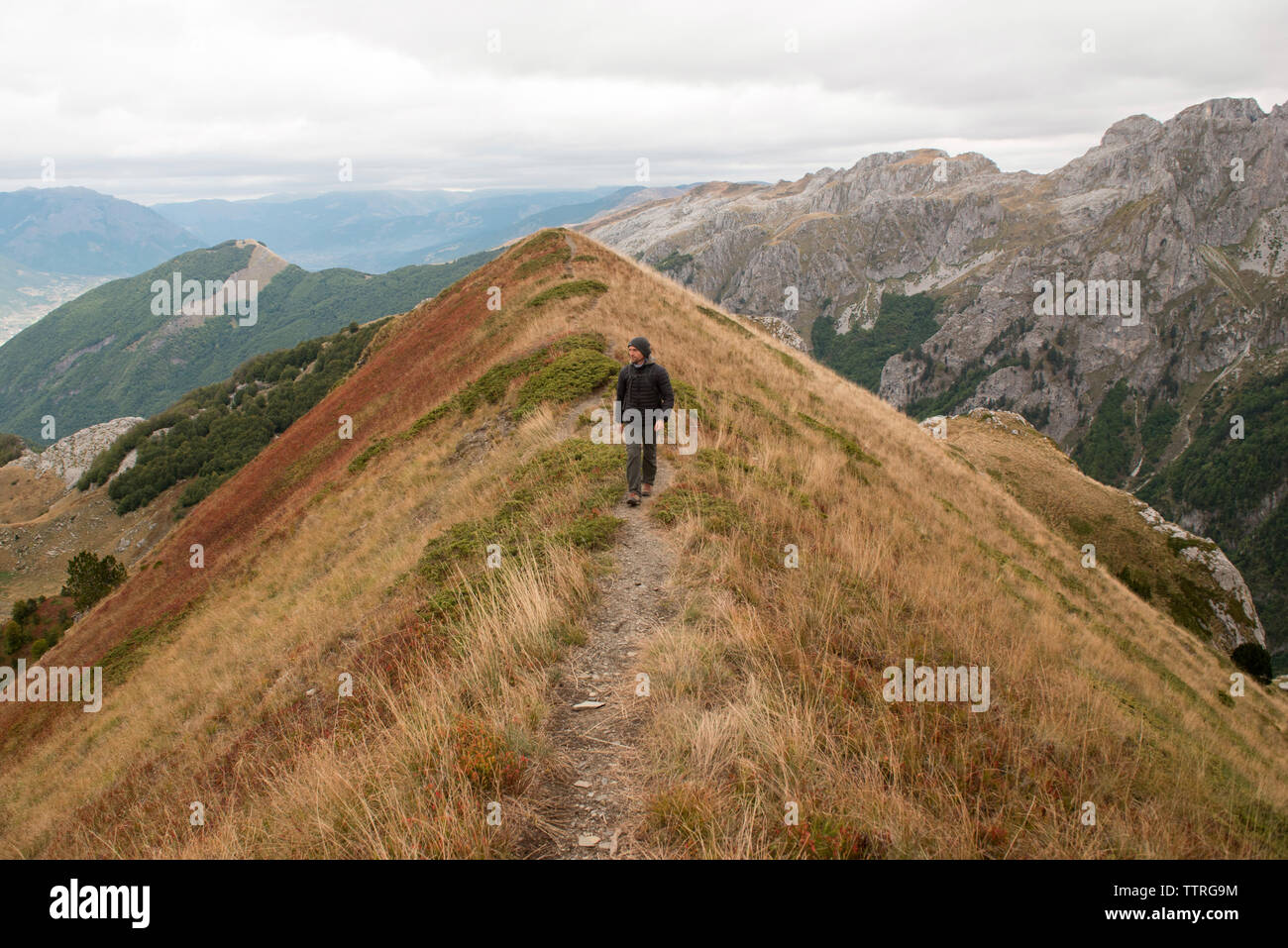 Man walking on mountain hi-res stock photography and images - Alamy