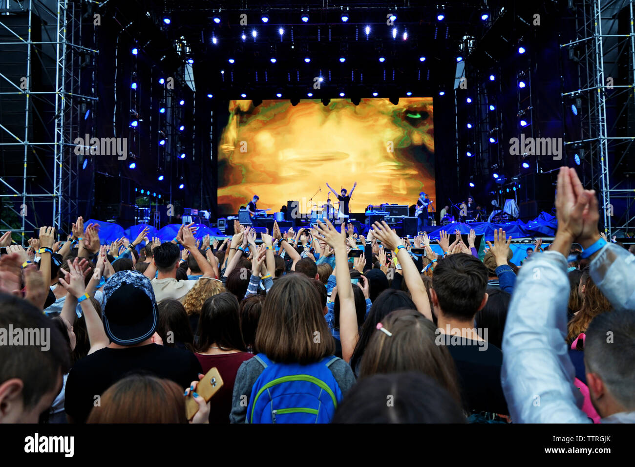 Crowd music fans waving hands hi-res stock photography and images - Alamy