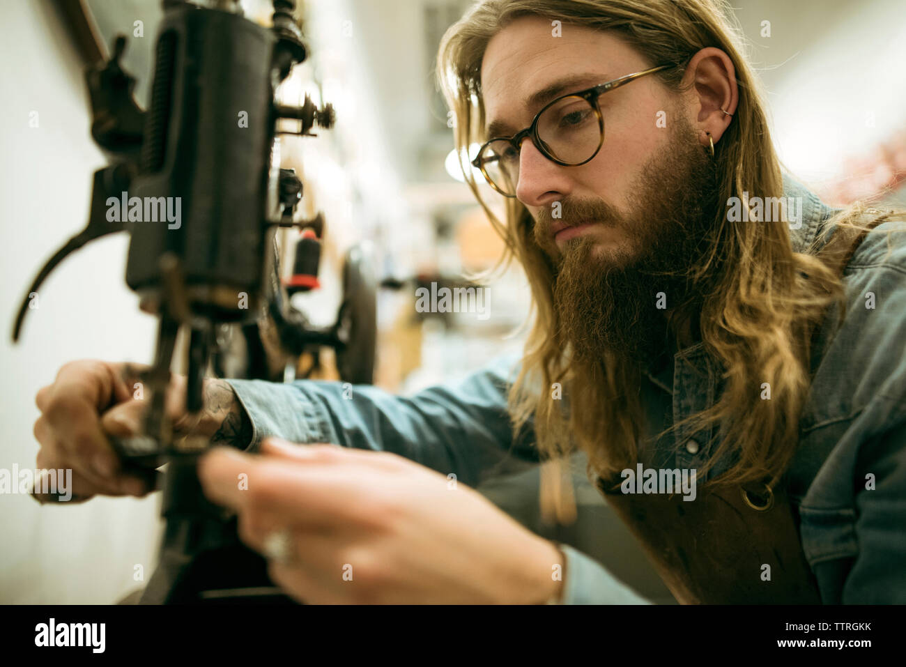 Adjusting machine hi-res stock photography and images - Alamy