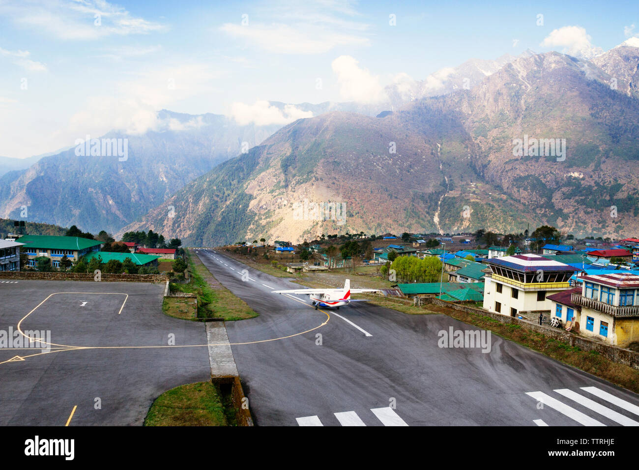 Airplane on runway by Mt. Everest Stock Photo Alamy