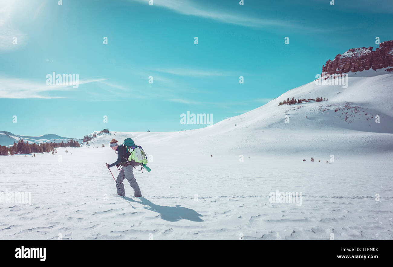 Hiker woman walking on snowy hi-res stock photography and images - Alamy