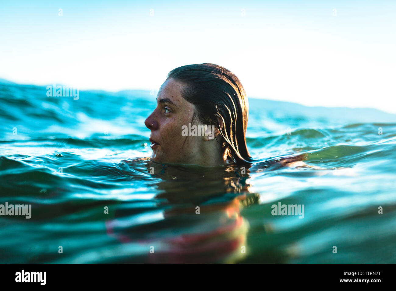 Swimming in sea hi-res stock photography and images - Alamy