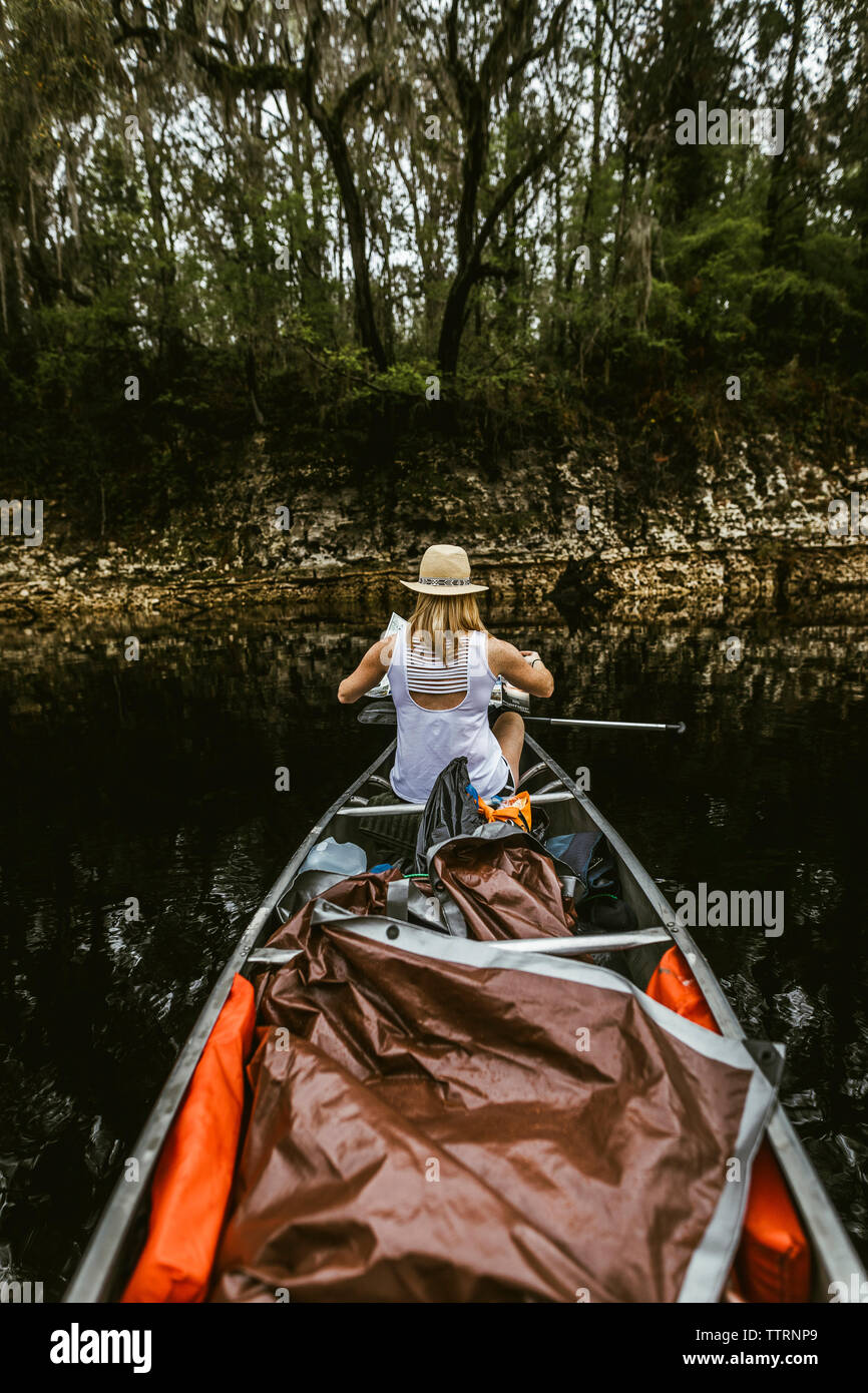 Woman canoeing hi-res stock photography and images - Alamy