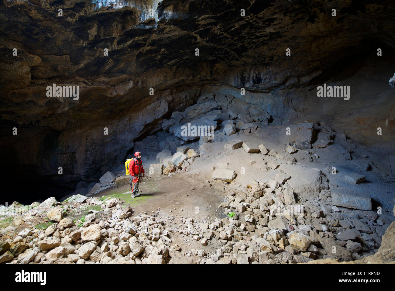 Spelunker in Cat Cave, Spain. Stock Photo