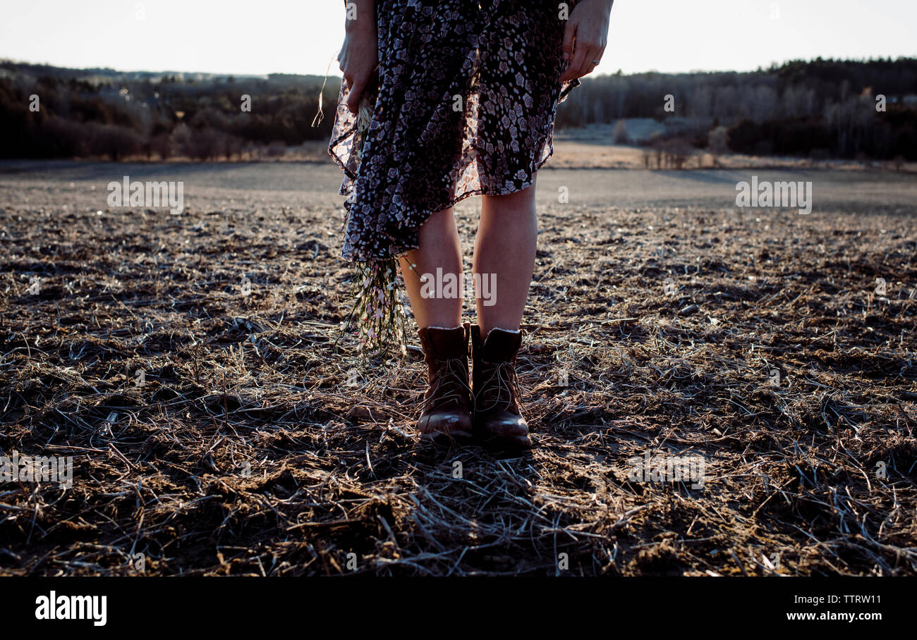 Woman wearing boots hi-res stock photography and images - Alamy