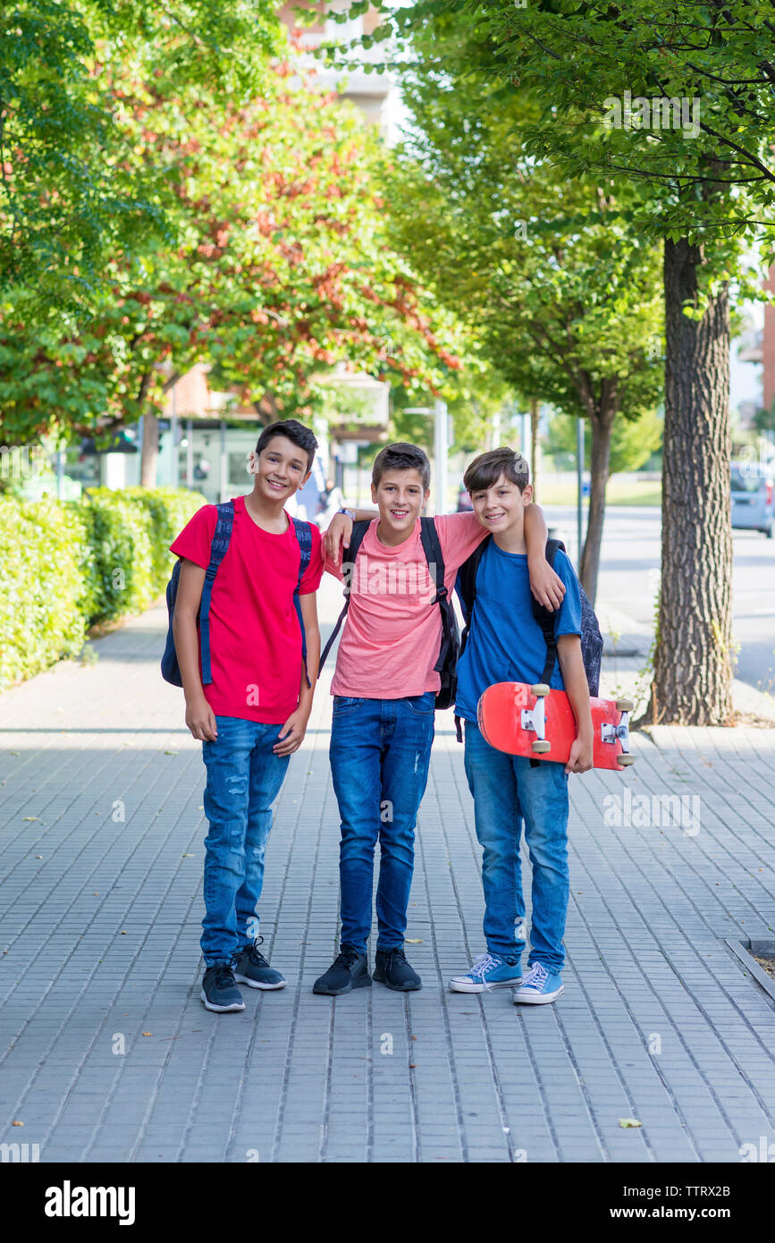 Group portrait boys arms around hi-res stock photography and images - Alamy