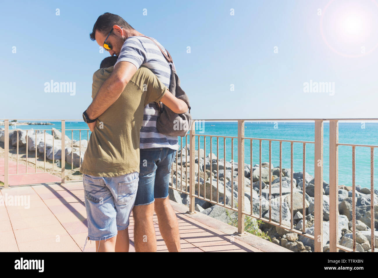 Father And Son Walking Away From Each Other