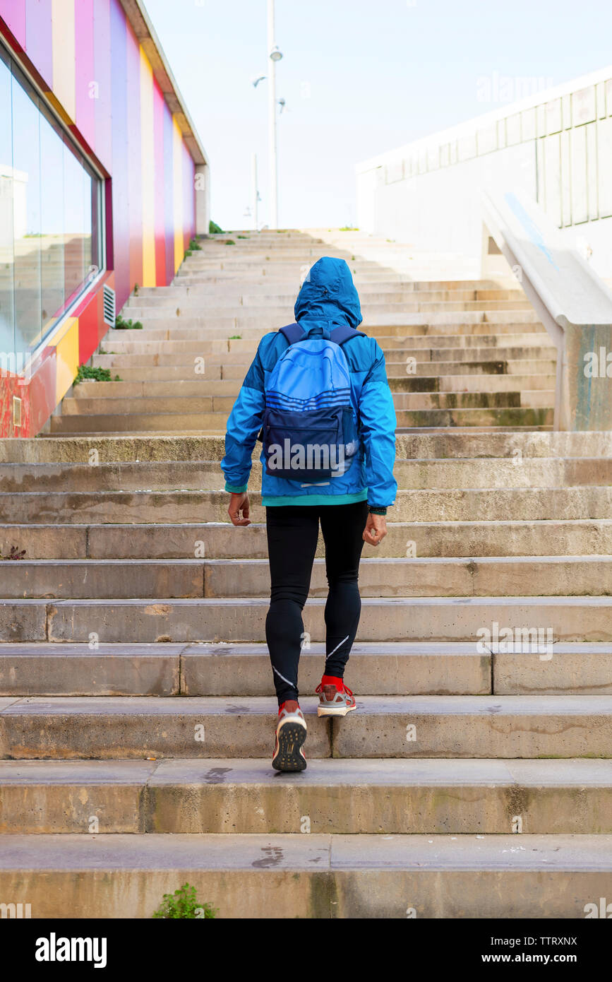 Climbing stairs with weighted backpack sale