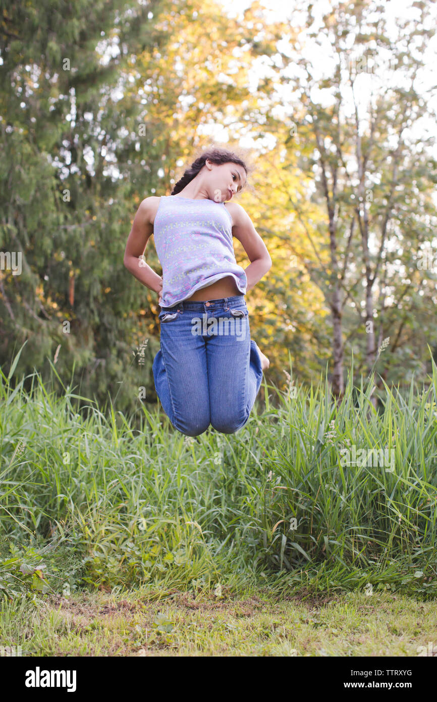Girl jumping in mid hi-res stock photography and images - Alamy
