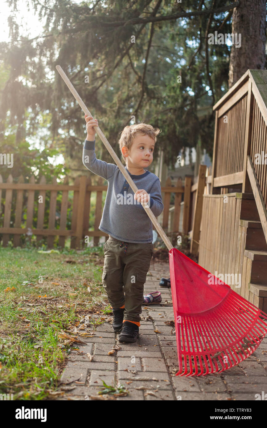 Holding Rake High Resolution Stock Photography and Images - Alamy